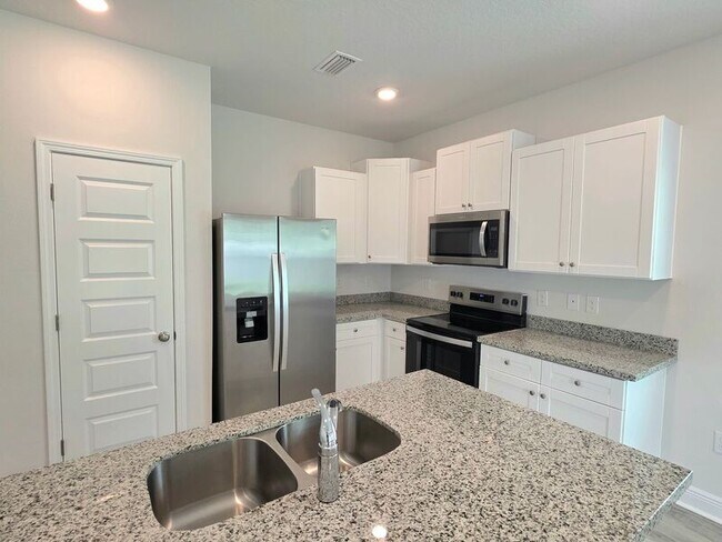 Foto del edificio - 8742 Meadow Flower Ln