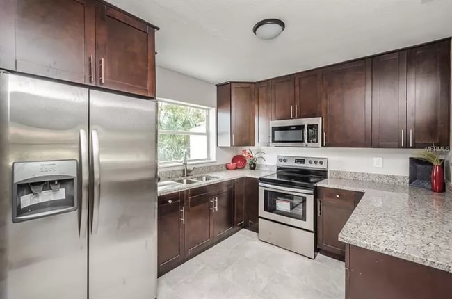 Building Photo - 6260 68th Terrace N