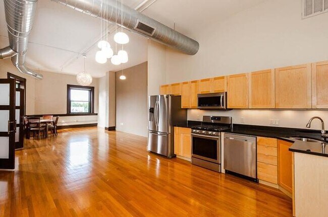 Building Photo - "Chic 1-Bed Condo in Vibrant Lynn: Modern ...