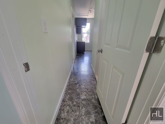 Building Photo - NEWLY RENOVATED TWO BEDROOM APARTMENT WITH...