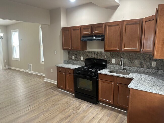 Building Photo - Remodeled End Unit - Baltimore