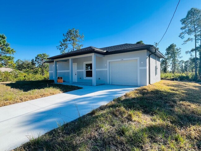 Building Photo - BRAND NEW ONE BEDROOM, ONE BATH-ONE CAR GARAGE- SOUTH LEHIGH ACRES