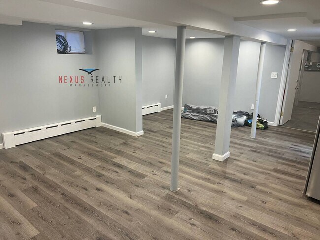 Building Photo - 21-44-44 71st St