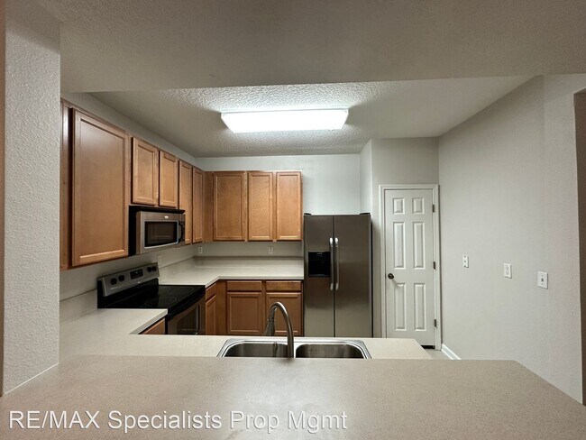 Building Photo - 2 br, 2 bath House - 575 Plantation Oaks #805