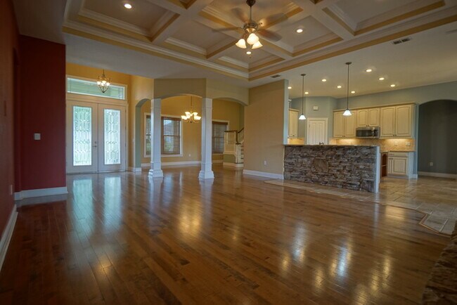 Building Photo - 4-bedroom, 3-bath and 3.5-car garage on pond