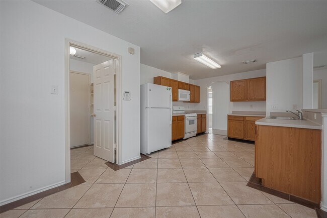 Foto del edificio - 6814 Shallow River Ct