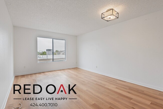 Building Photo - Sun-Drenched One Bedroom with Central Heat...
