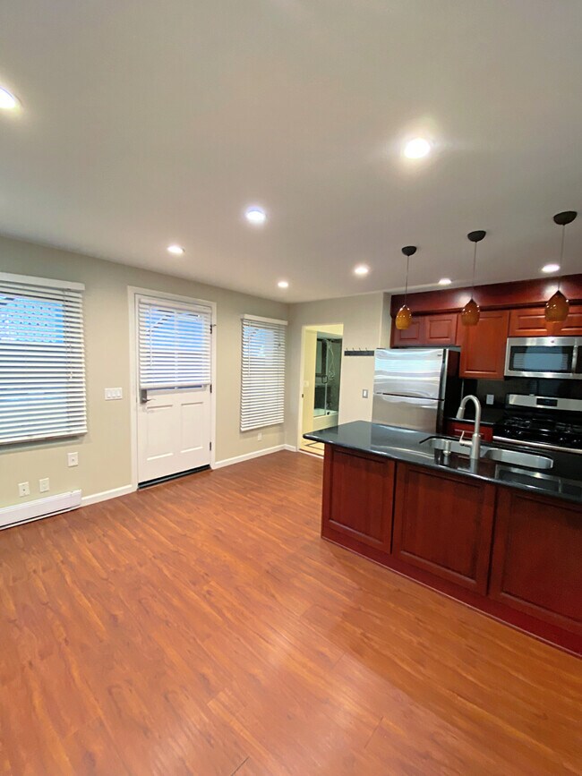 Living and kitchen area - 2613 Manhattan Ave
