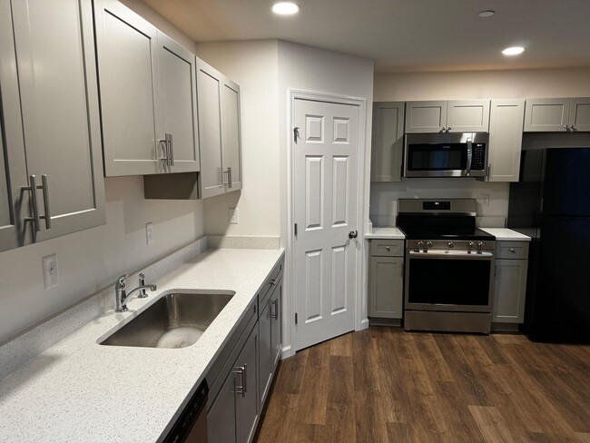 Building Photo - Step into the future of living with our sl...