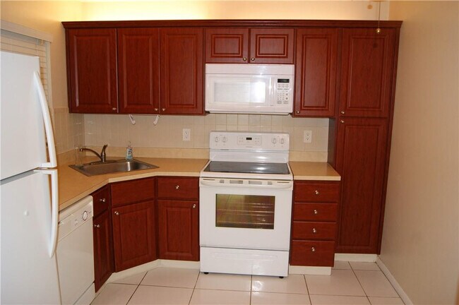 Building Photo - 3781 Cocoplum Cir
