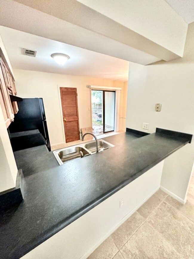 Building Photo - Nicely remodeled 2 bedroom end unit town h...