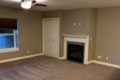 Open spacious living room with fireplace - 6762 N Frostwood Pkwy