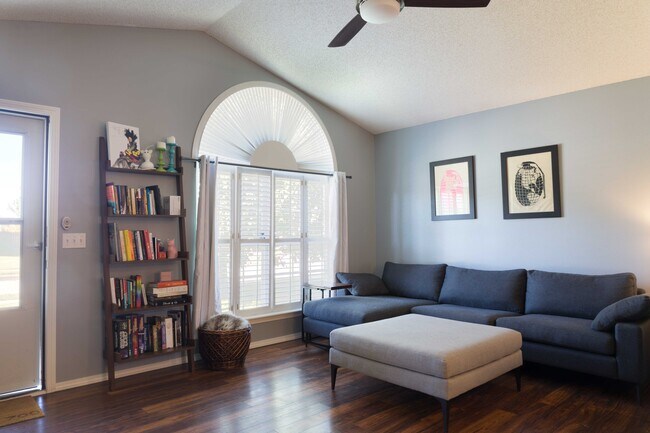 Second view of the living room with west facing bay window - 700 NE Fenway Ave