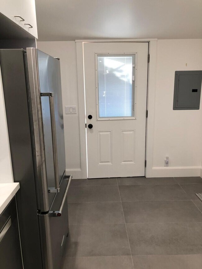 Entry door in kitchen - 321 N Delaware St
