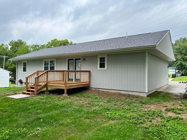 Backyard with deck off primary bedroom - 207 Lynn St