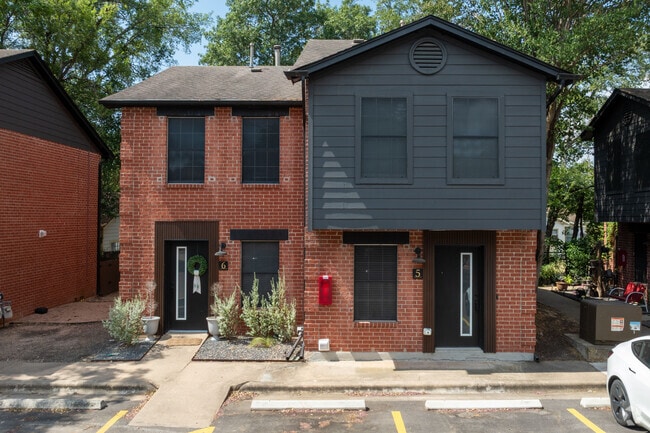 Building Photo - The Woods at Menchaca