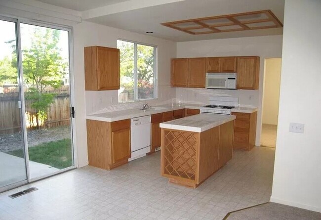 Building Photo - Coming Soon: Spacious 4-Bedroom Home in a ...