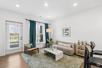 Trek - 1BR, 1BA - 835SF _ Living Room - Boardwalk at Research Park