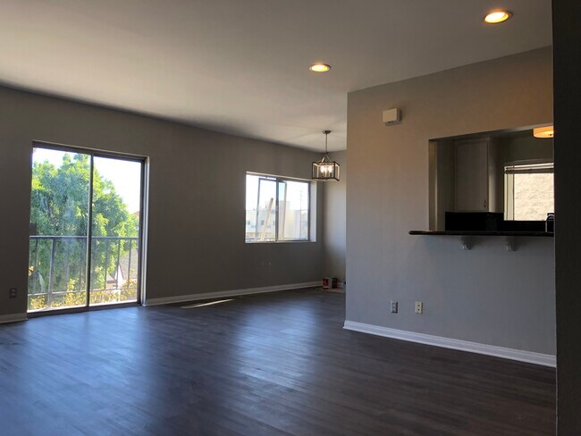 Open concept living room and dining room - 1115 S Elm Dr