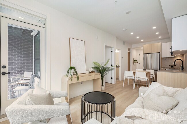 Building Photo - Stylish 2 Bed 1 Bath Condo for Rent in Surrey City Centre!