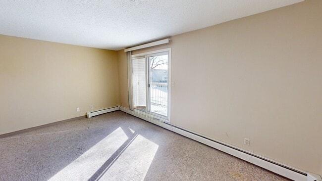 Building Photo - 10028-10105 105 Ave