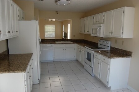 Building Photo - The Woods Community -  3/2 in Gated Commun...
