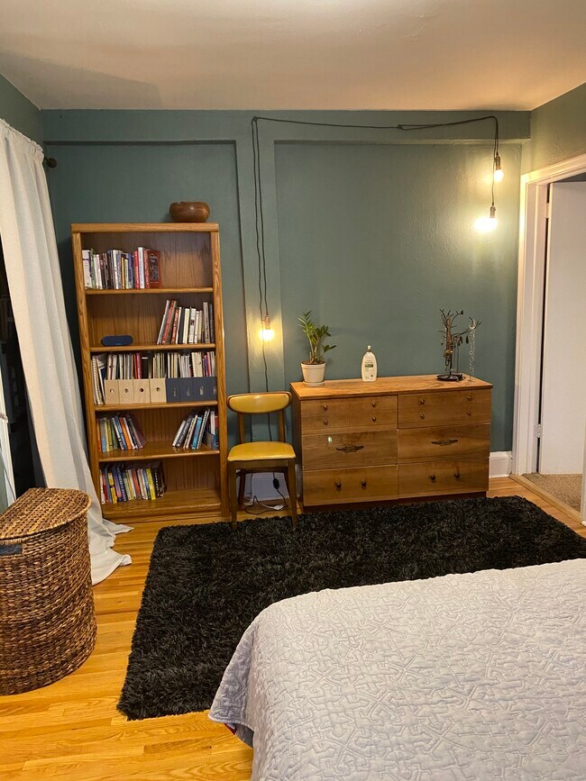 Main bedroom with door to 2nd bedroom. - 4325 BRYANT Ave S APT