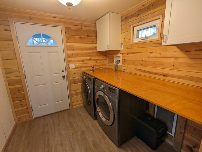 Entryway and laundry - 23603 W Lake Kayak Dr