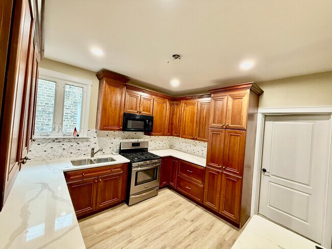 Foto del edificio - 5644 N Talman Ave