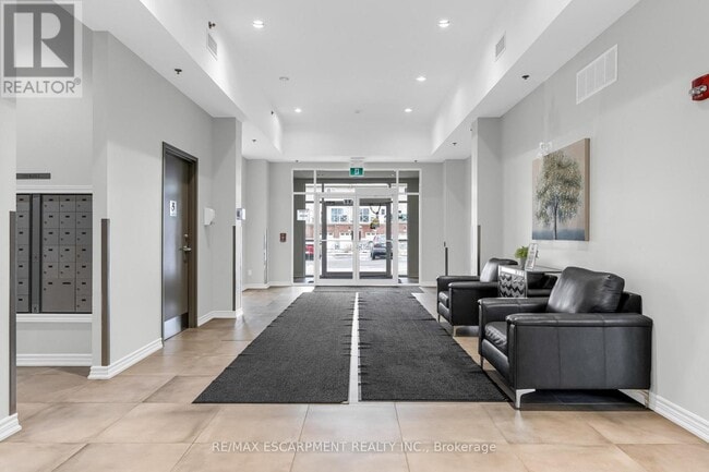 Photo du bâtiment - 1370 Costigan Rd