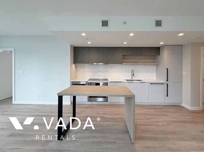 Building Photo - Myriad 3 BR APT Rental 905-567 Emerson St Coquitlam: VADA