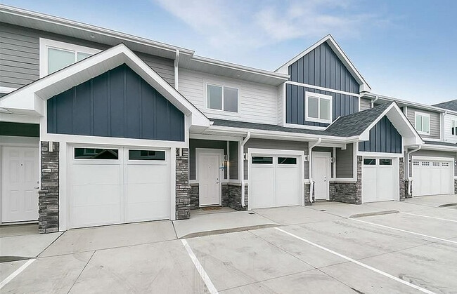 Townhomes include a 1 or 2-car attached garage. - Park 88 Apartments