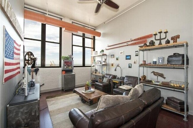 Living room space with large windows - 1133 9th W St
