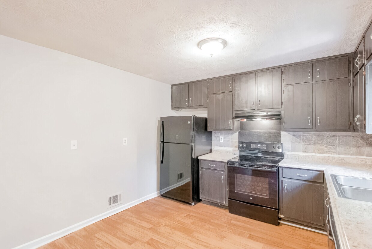 Foto principal - 2628 Candler Woods Dr