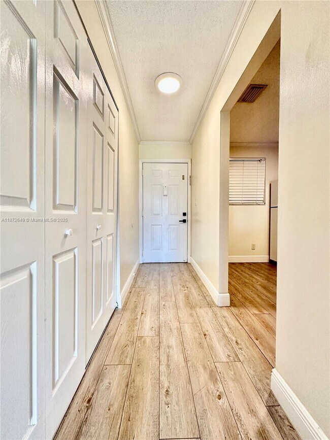 Building Photo - 7406 Woodmont Terrace