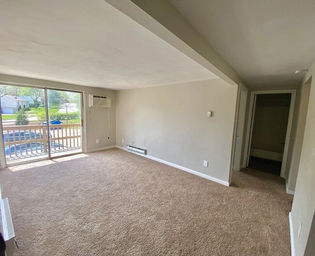 Living Room With Balcony - PARK MANOR