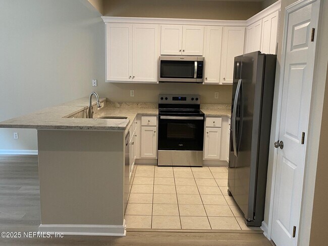 Foto del edificio - 5697 Parkstone Crossing Dr