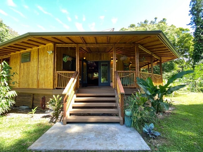 Building Photo - For Rent: Custom Bamboo Home with Lush Garden Setting