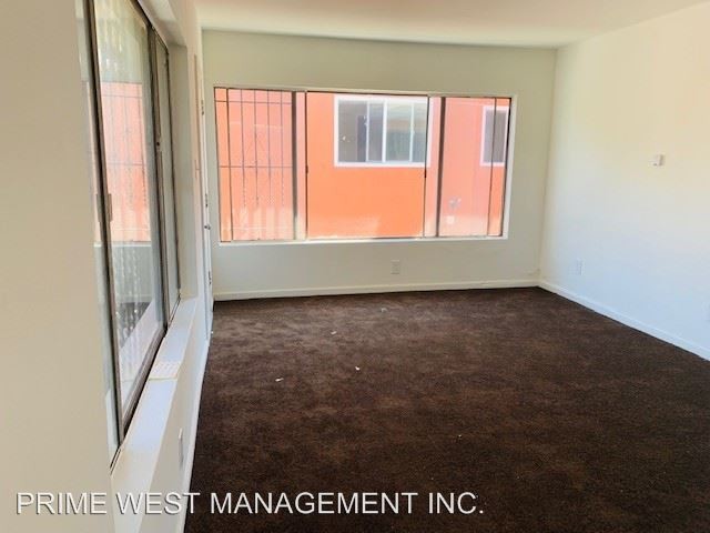 Building Photo - 10611 S Avalon Blvd
