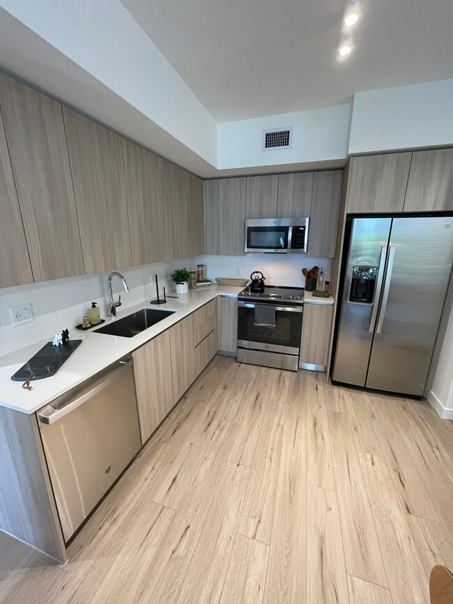 Building Photo - 7063 W 5th Ct