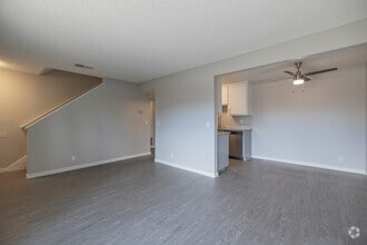 3BR, 2BA - 1,112 SF - Living Room - The Mews at Dixon Farm
