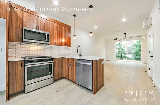 Building Photo - Available Now! Modern Luxury Living in Por...