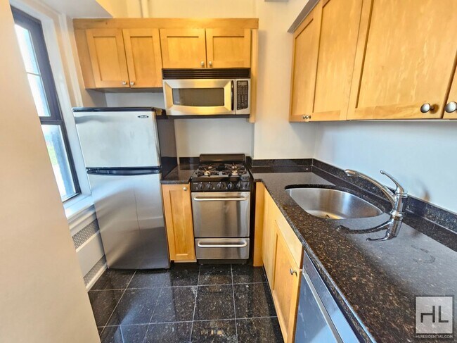 Building Photo - Studio in West Village | 9th Floor, Full-Service Building
