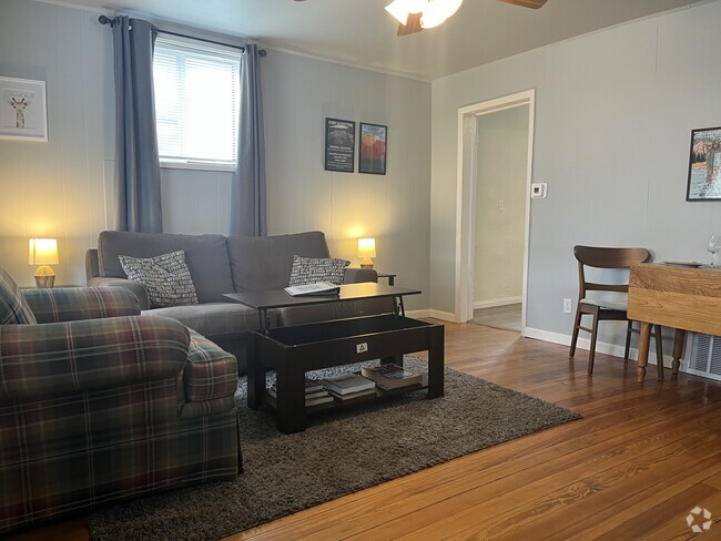 Fully furnished home with full couch some comfy chairs. - 414 S Commercial St