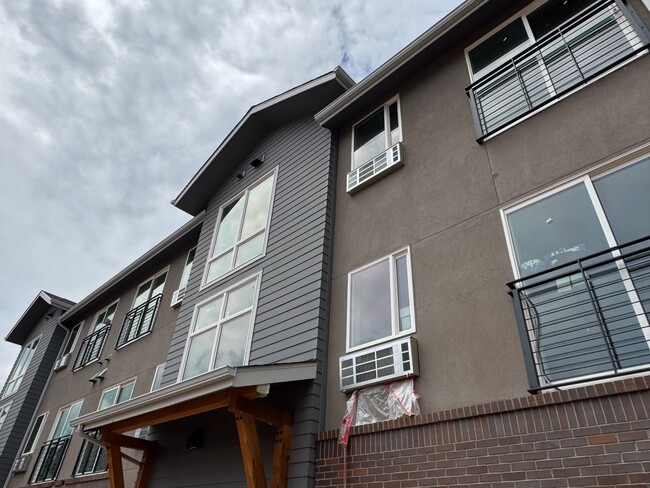 Building Photo - Beautiful, Brand New One Bedroom Loft Near...