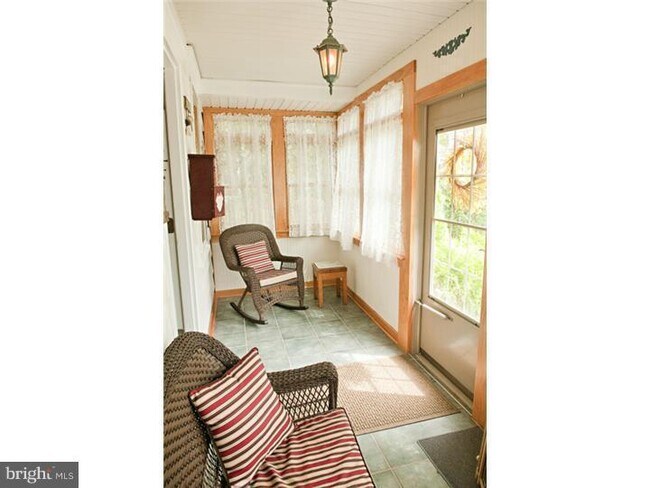 Porch - 120 W Franklin St