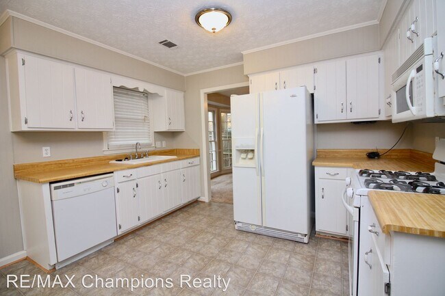 Building Photo - 4 br, 2.5 bath House - 6930 Cinnamon Loop