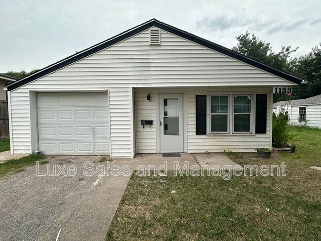 Building Photo - 1133 S Miles Ave