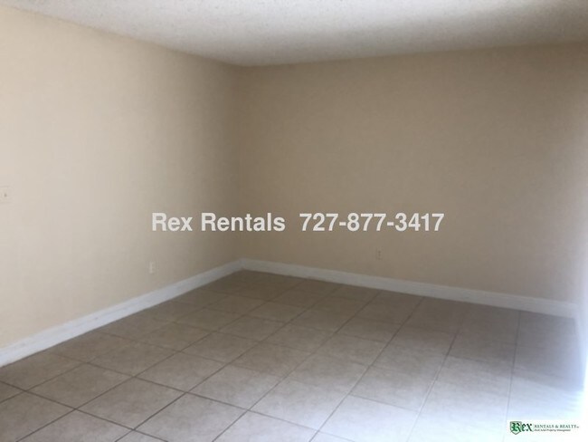Building Photo - Spacious 2/1.5 townhouse at the Enclave