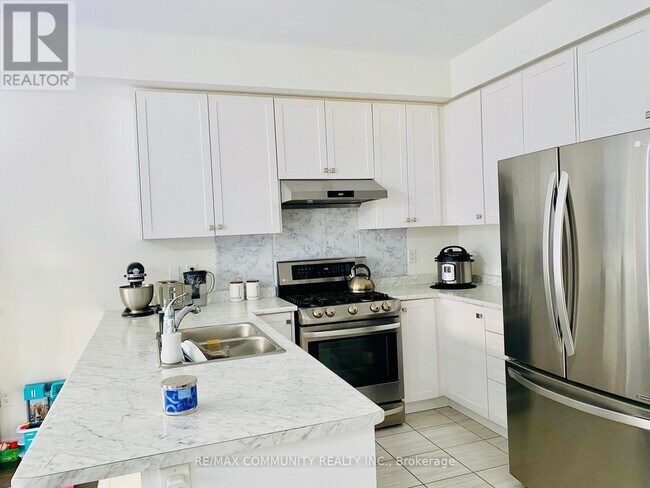 Photo du bâtiment - 1163 Enchanted Crescent